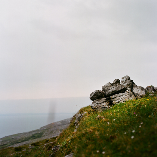 
			<br /><em>hiking the burren
            <br />in patches of sunlight
			<br /><br /><br /><br />
            <br />(county clare / SW)</em>